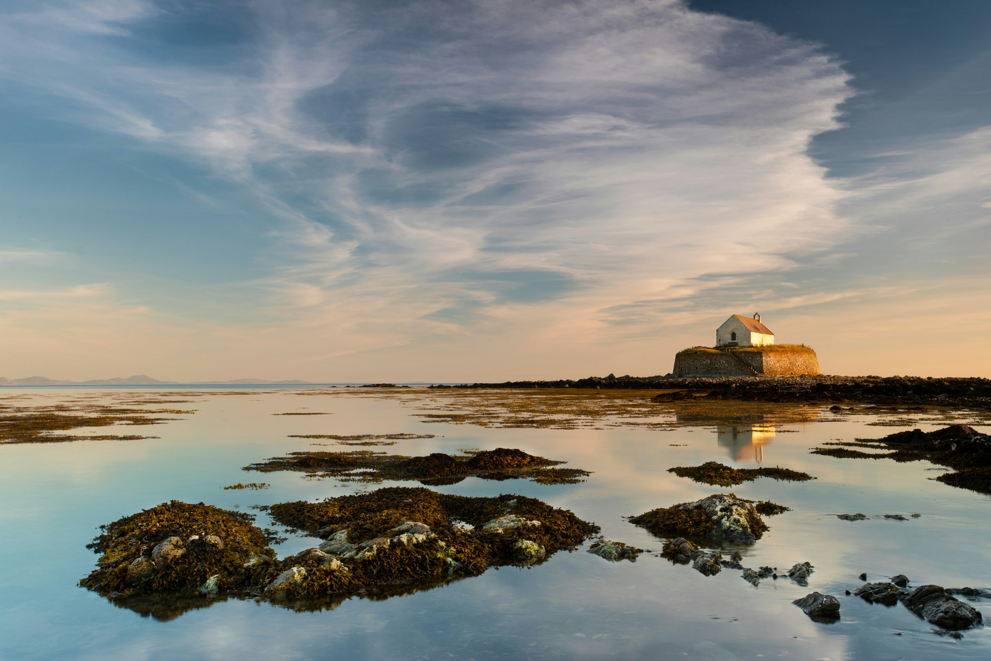 Shot this during sunset last week at St Cwyfan’s Church on Anglesey. When the tide is in the church is only accessible by boat (or swimming!).